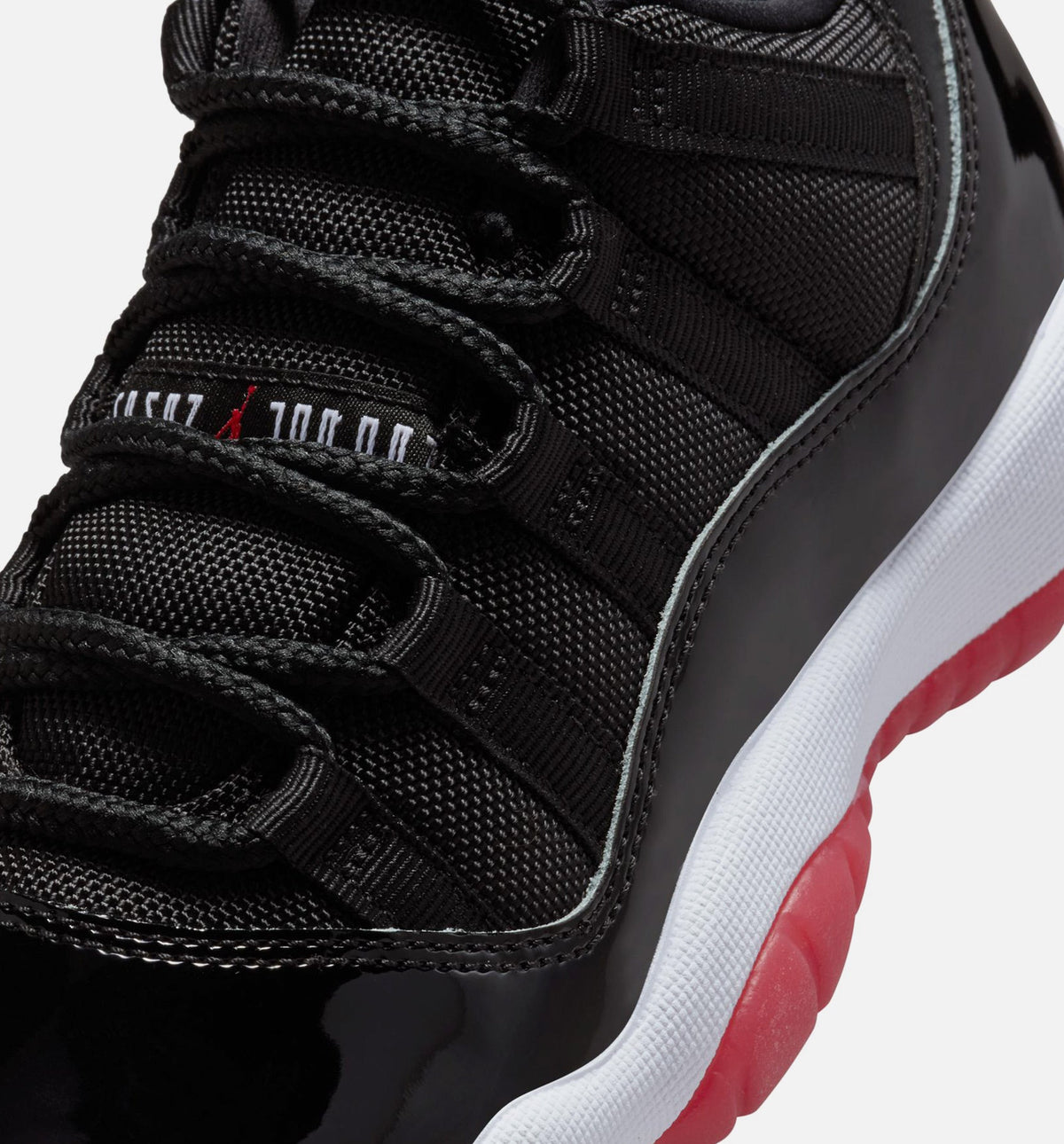 Air Jordan 11 Retro Bred Grade School Lifestyle Shoe – Black/Varsity Red/White